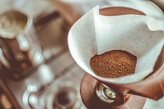 Close-up of coffee grounds in a paper filter