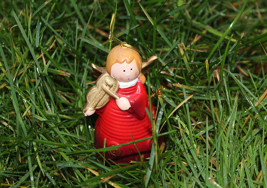 Red Angel Figurine Ornament in Green Grass