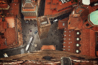 Aerial View of Historic European City Square with Red Rooftops