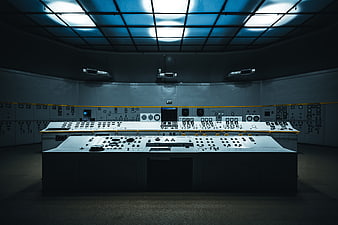 Retrofuturistic Control Room with Blue Lighting