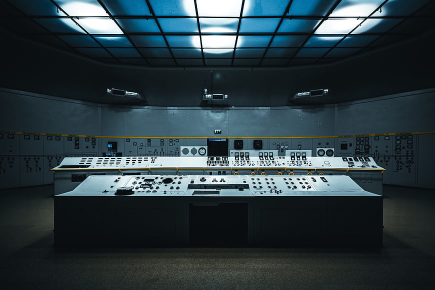 Retrofuturistic Control Room with Blue Lighting