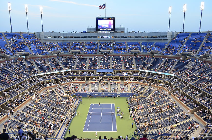 Aerial View of Tennis Stadium with Blue Court and Spectators