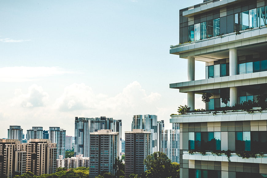 Modern City Skyline with High-Rise Buildings and Blue Sky