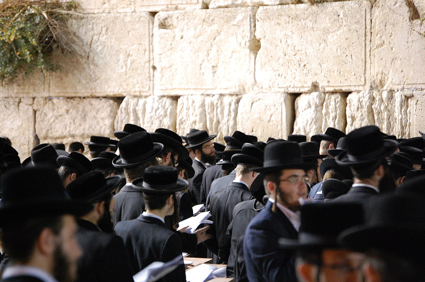Orthodox Jewish Men Praying at the Western Wall in Jerusalem
