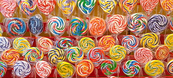Colorful Swirl Lollipops Displayed in Rows