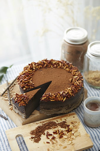 Chocolate Mille Crepe Cake with Almonds and Cocoa Powder