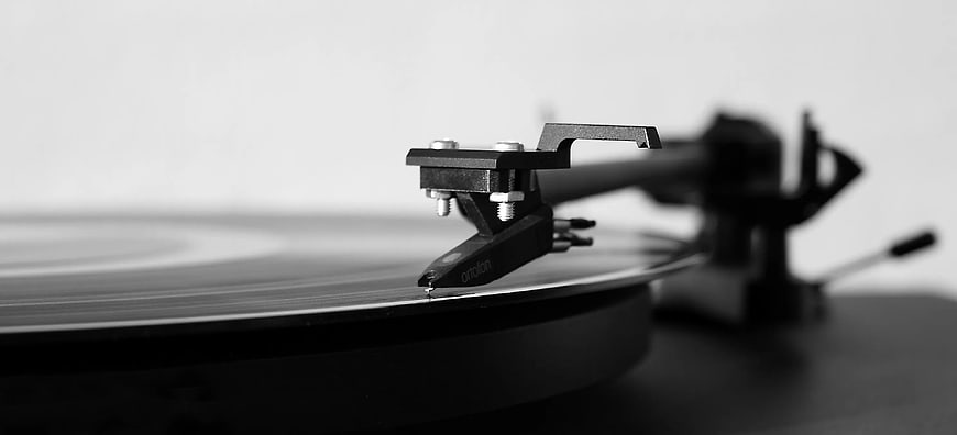 Close-up of vinyl record turntable tonearm and stylus