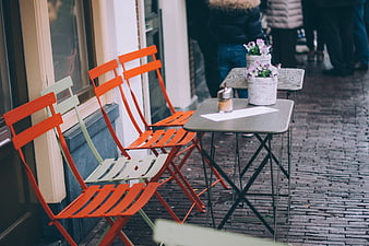 Outdoor Cafe Seating on Cobblestone Street
