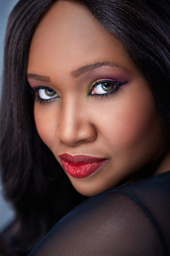 Close-up Portrait of Woman with Bold Makeup