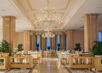 Luxury hotel breakfast buffet dining room with chandelier