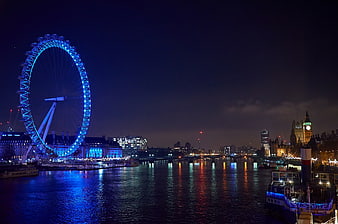 London Eye and Big Ben Night View from River Thames