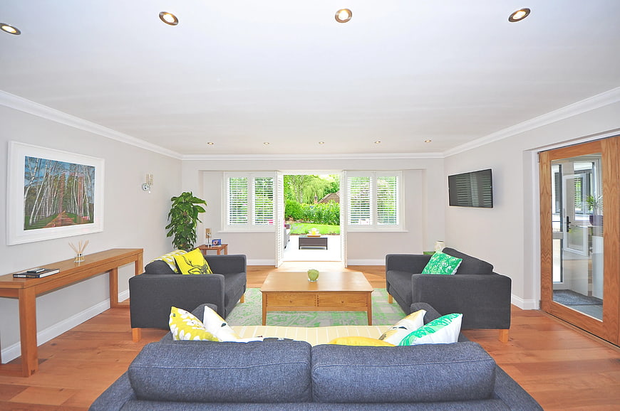 Bright Modern Living Room with Grey Sofas and Garden View