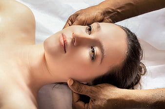 Woman Receiving Head Massage For Relaxation And Wellness Therapy
