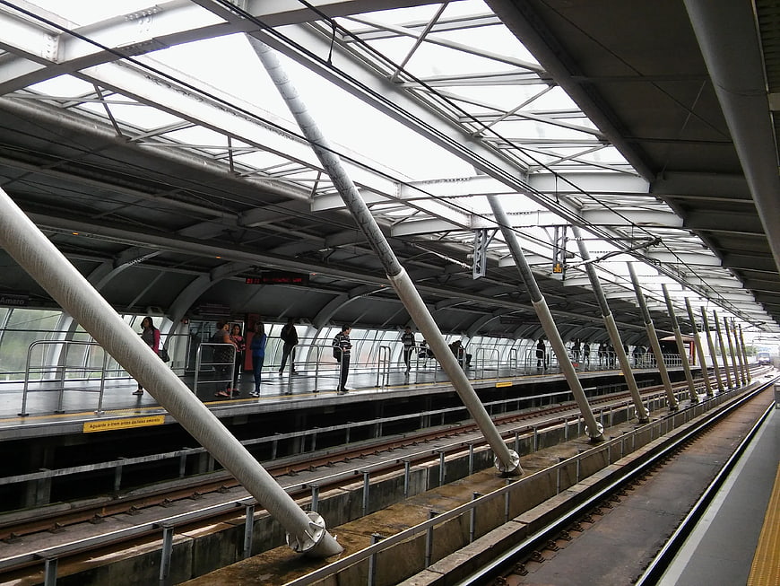 Modern elevated train station platform with steel beams