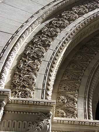 Detailed Gothic stone arch with intricate floral carvings