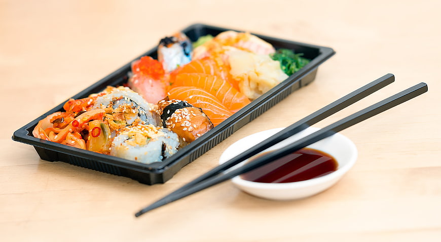 Sushi Takeout Box with Chopsticks and Soy Sauce