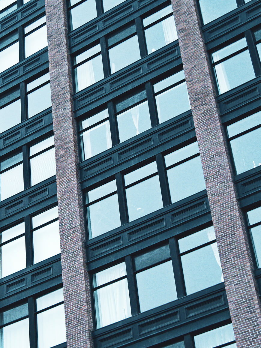 Modern Brick and Glass Building Facade Architecture