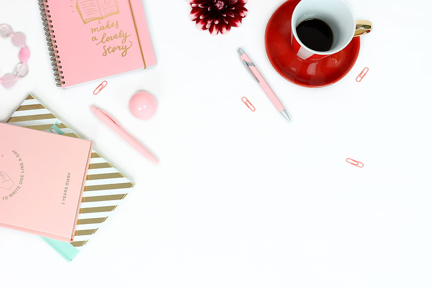 Pink Office Supplies Flat Lay with Coffee and Notebooks