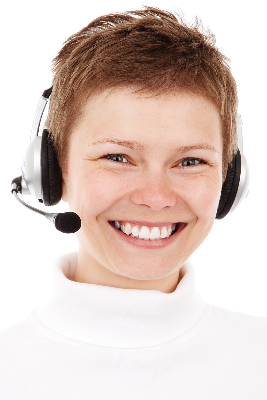 Smiling woman with headset for customer service support