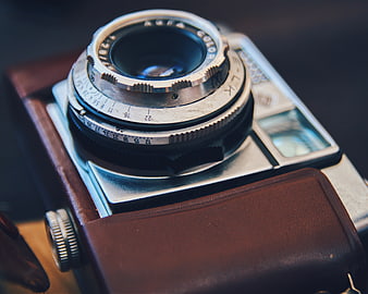 Close-up of vintage Agfa camera lens with leather body