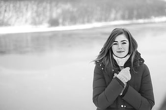 Young Woman in Winter Jacket and Scarf Portrait