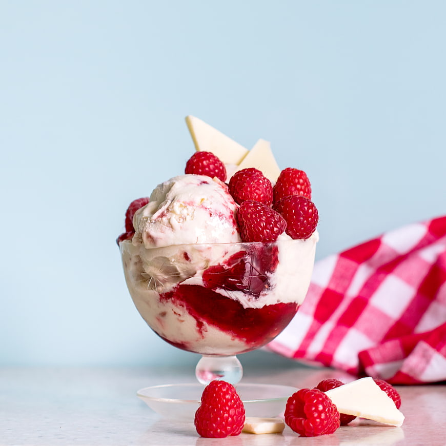 Raspberry Ice Cream Sundae with White Chocolate and Checkered Napkin