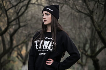 Woman in Black Beanie and Sweatshirt in Forest