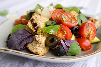 Fresh Mediterranean Salad With Tomatoes, Olives, and Croutons
