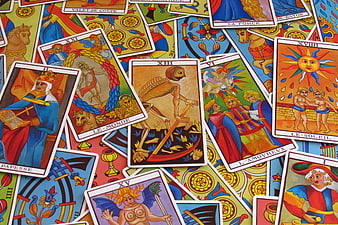 Scattered Tarot Cards Spread with The World and Death