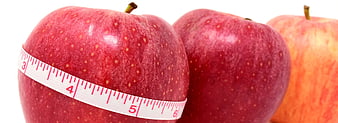 Red Apples with Measuring Tape for Diet and Weight Loss
