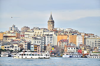 Galata Tower and Istanbul Cityscape with Ferries on the Bosphorus