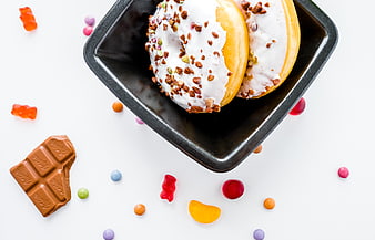 Top View of Glazed Donuts with Chocolate and Gummy Bears
