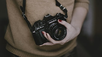 Woman Holding Vintage Yashica Film Camera