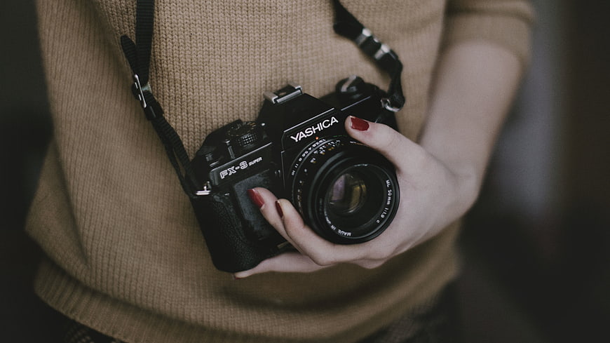 Woman Holding Vintage Yashica Film Camera