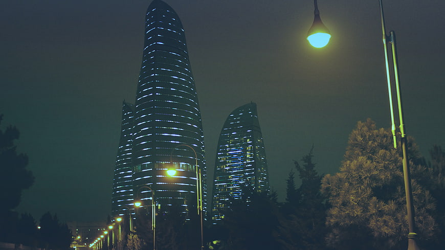 Flame Towers Baku Night Skyline with Streetlights