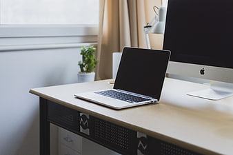 Modern Home Office Desk with Laptop and Monitor