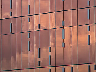 Abstract copper building facade with geometric pattern