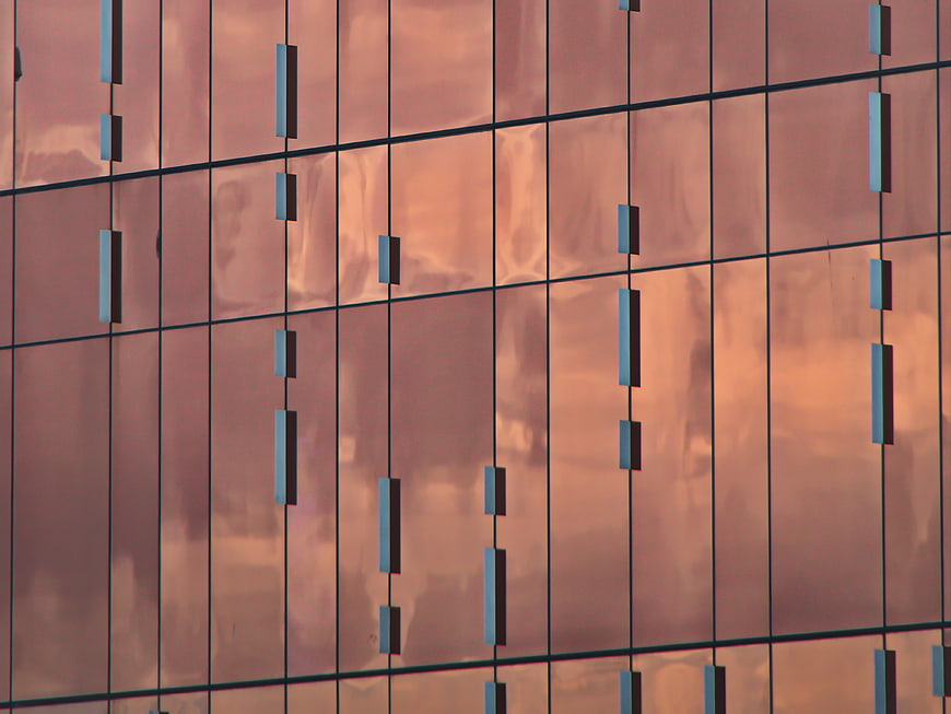 Abstract copper building facade with geometric pattern
