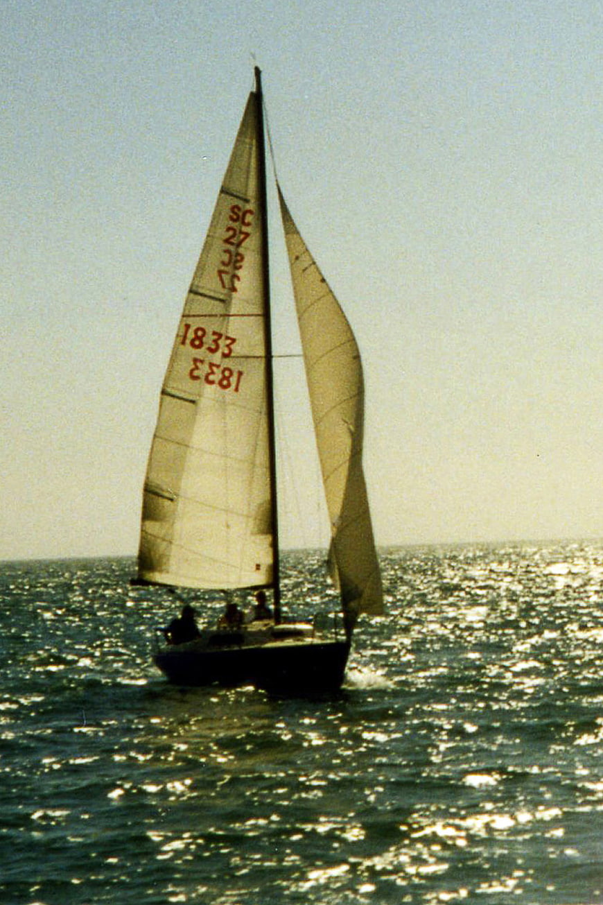 Vintage Sailboat Sailing on Sparkling Ocean Water
