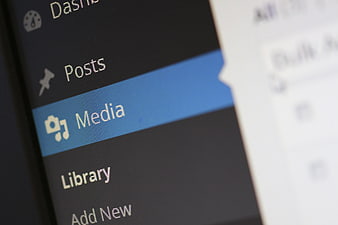 Close-up of WordPress Media Menu on Smartphone Screen