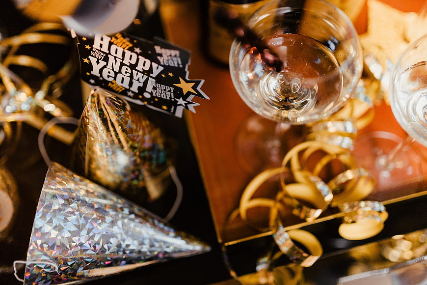 Happy New Year party setup with champagne and decorations