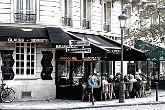 Classic Parisian Brasserie Street Scene With Outdoor Seating