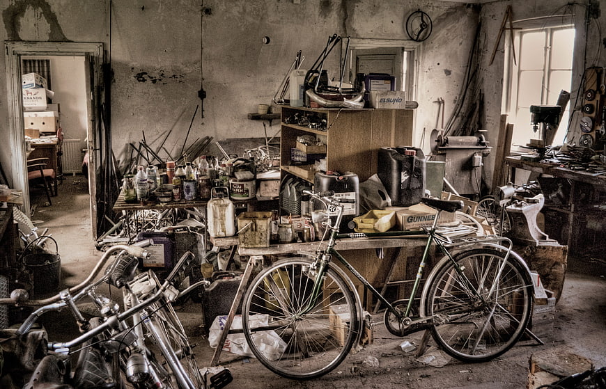 Cluttered Vintage Bicycle Repair Workshop Interior