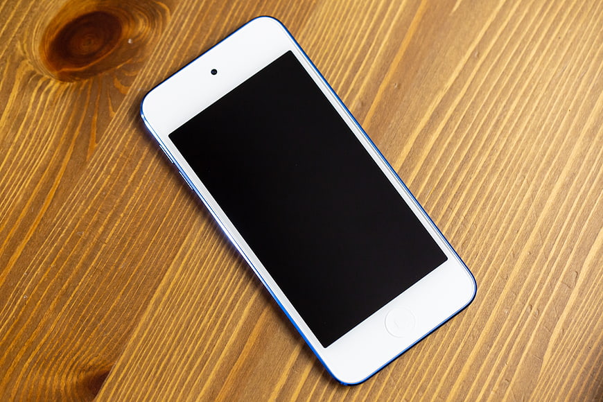 White Smartphone Mockup on Wooden Table Surface