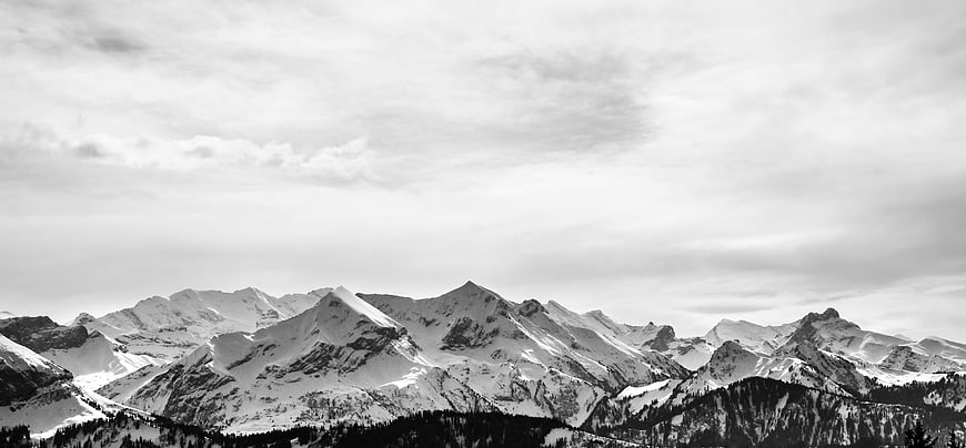 Panoramic Black and White Snowy Mountain Range Landscape