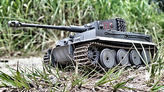 Gray Toy Tank Model in Grass
