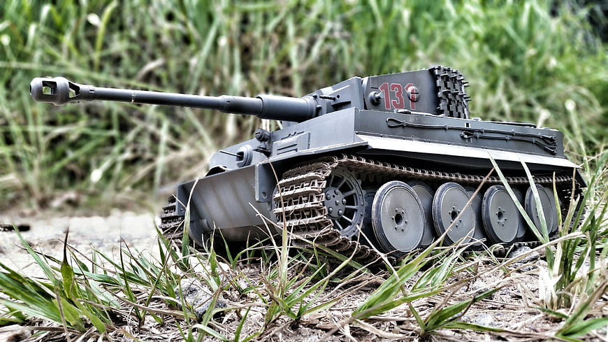 Gray Toy Tank Model in Grass