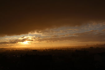 Dramatic sunset over Paris cityscape silhouette