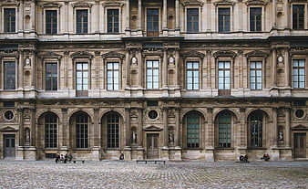 Grand Renaissance Palace Facade with Cobblestone Courtyard