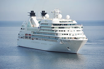 Seabourn Quest cruise ship sailing on calm blue ocean